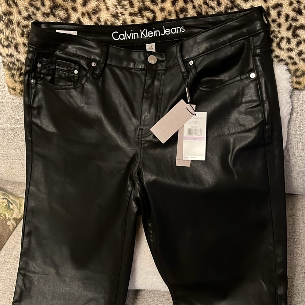 NWT Calvin Klein black coated jean/legging, slim fit, size 32/14